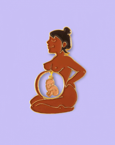 Pin's coucou suzette femme enceinte noire et bébé métisse